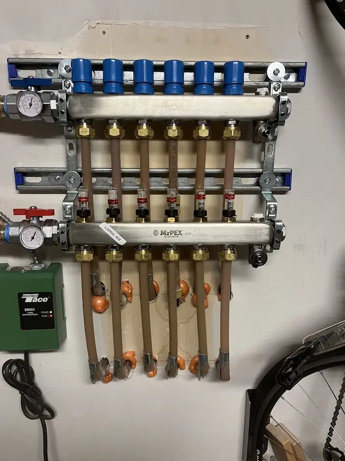 Plumber performing Leak Detection at a residential property in Malverne